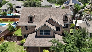 New dimensional shingle roof on two‑story house in South Texas