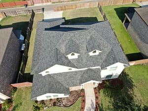Residential roof replacement with gray shingles in Harlingen, Texas completed by XYZ Roofing.