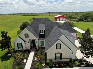 Modern home with new architectural shingle roof in Corpus Christi, Texas completed by XYZ Roofing.