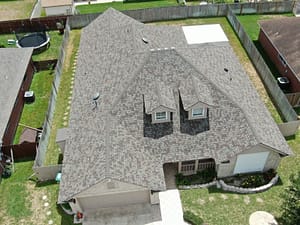 Freshly installed roof with high-quality shingles on custom home in Edinburg, TX